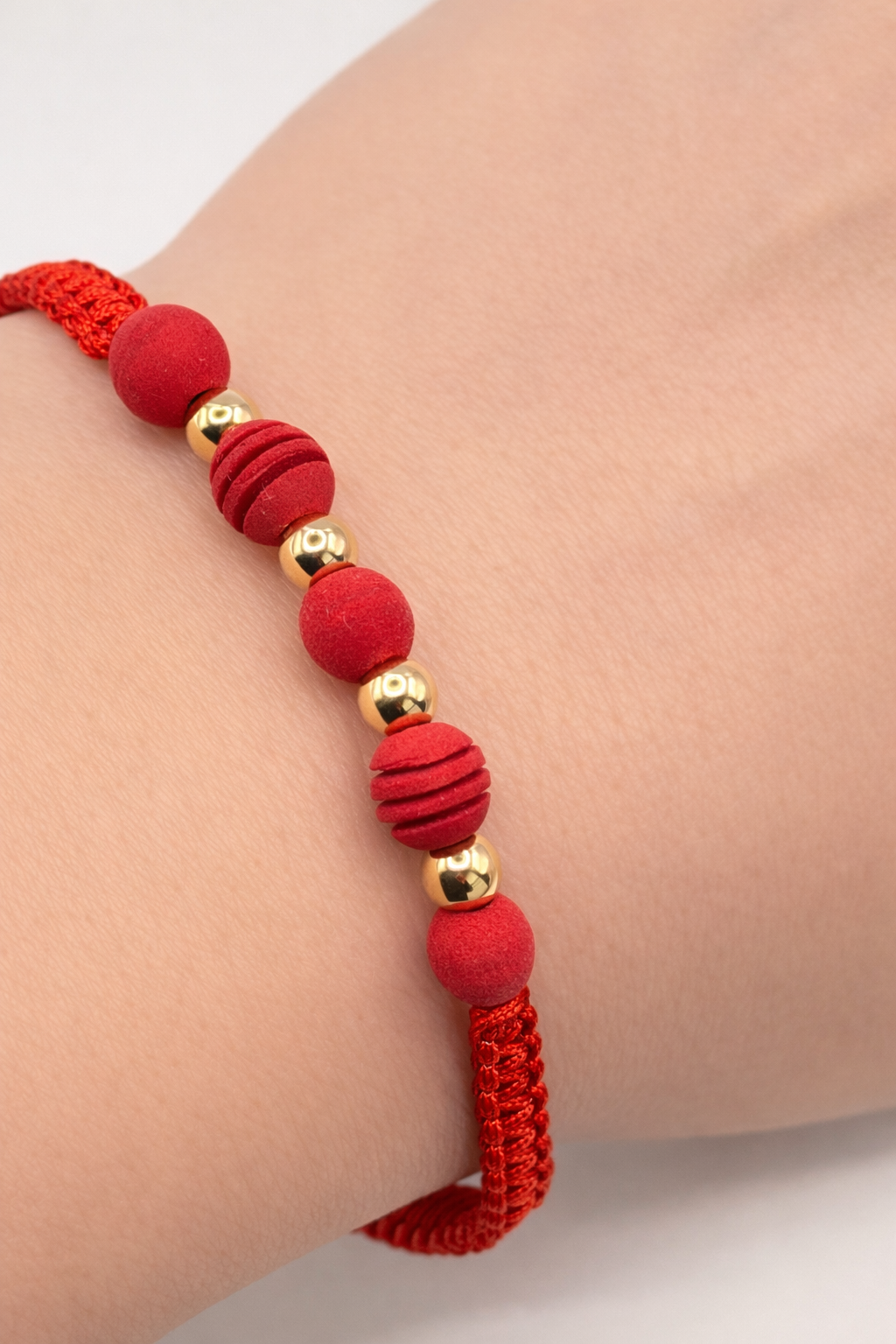 Bracelet with gold beads
