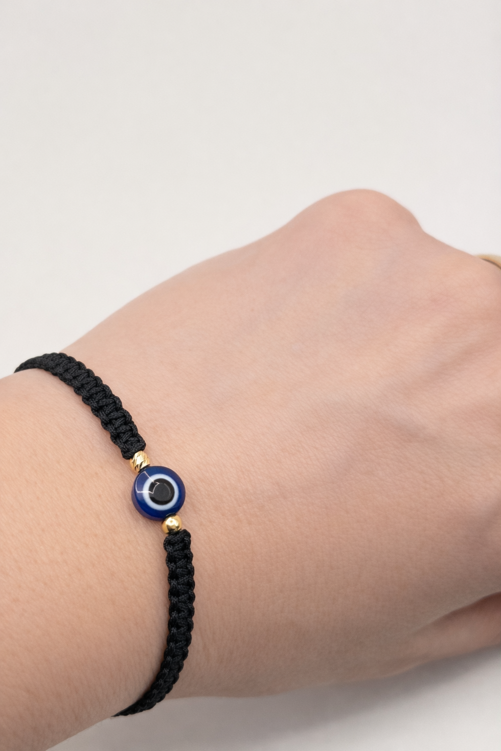 BRACELET WITH GOLD BEADS