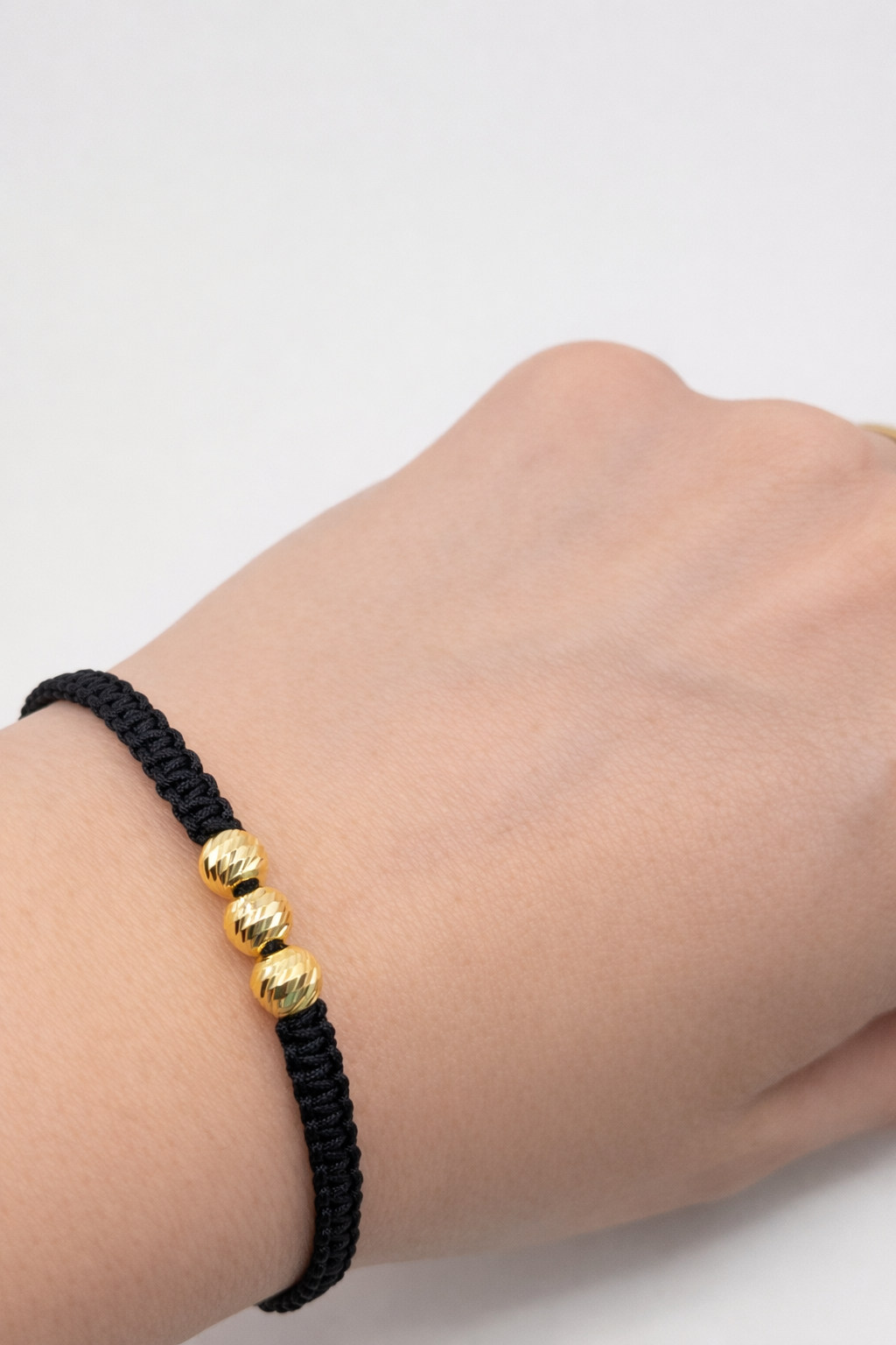 BRACELET WITH GOLD BEADS