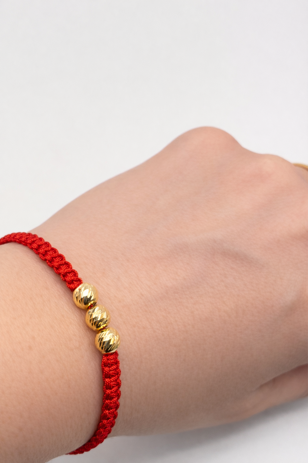 Bracelet with gold beads