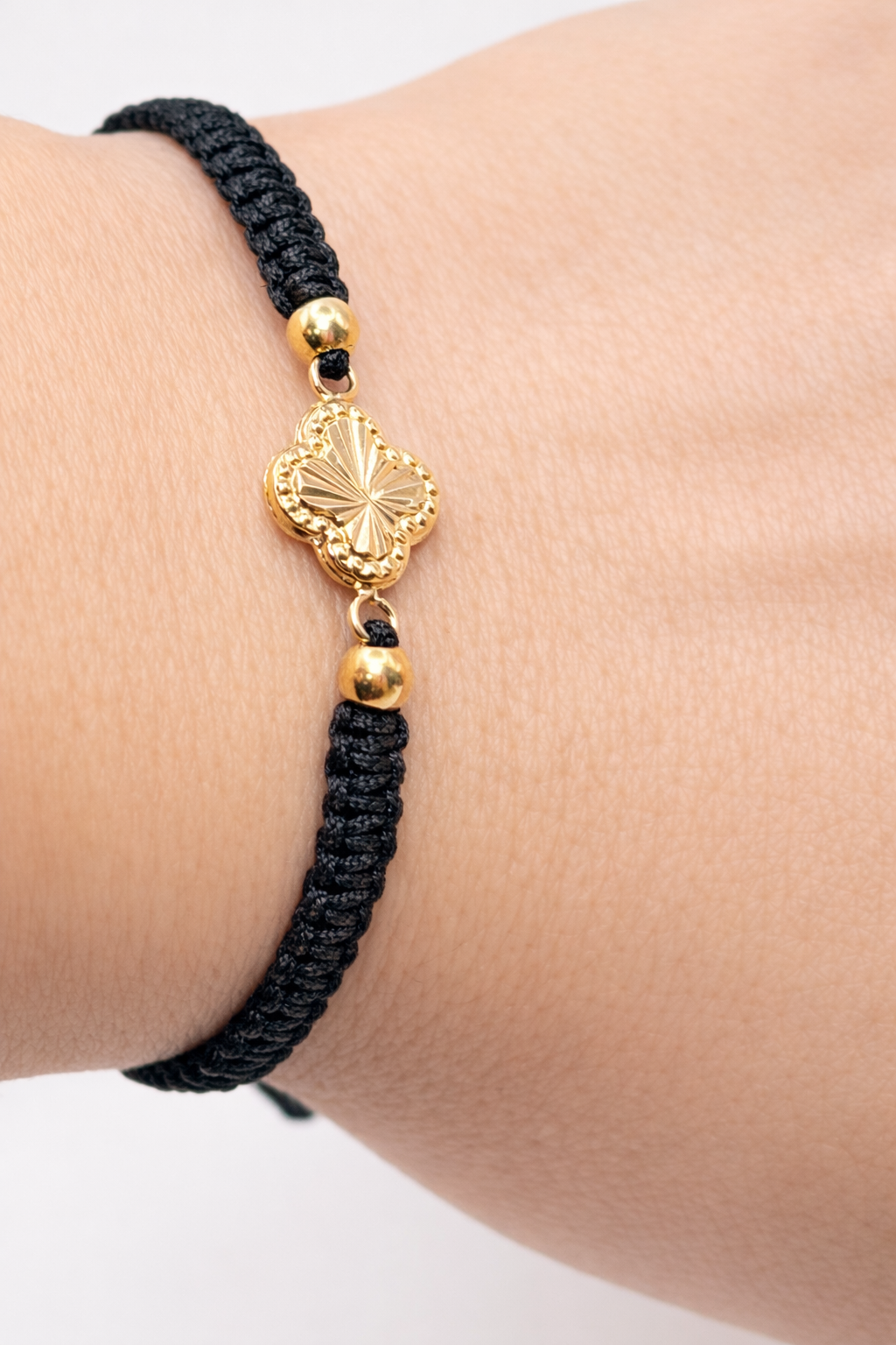 BRACELET WITH GOLD BEADS