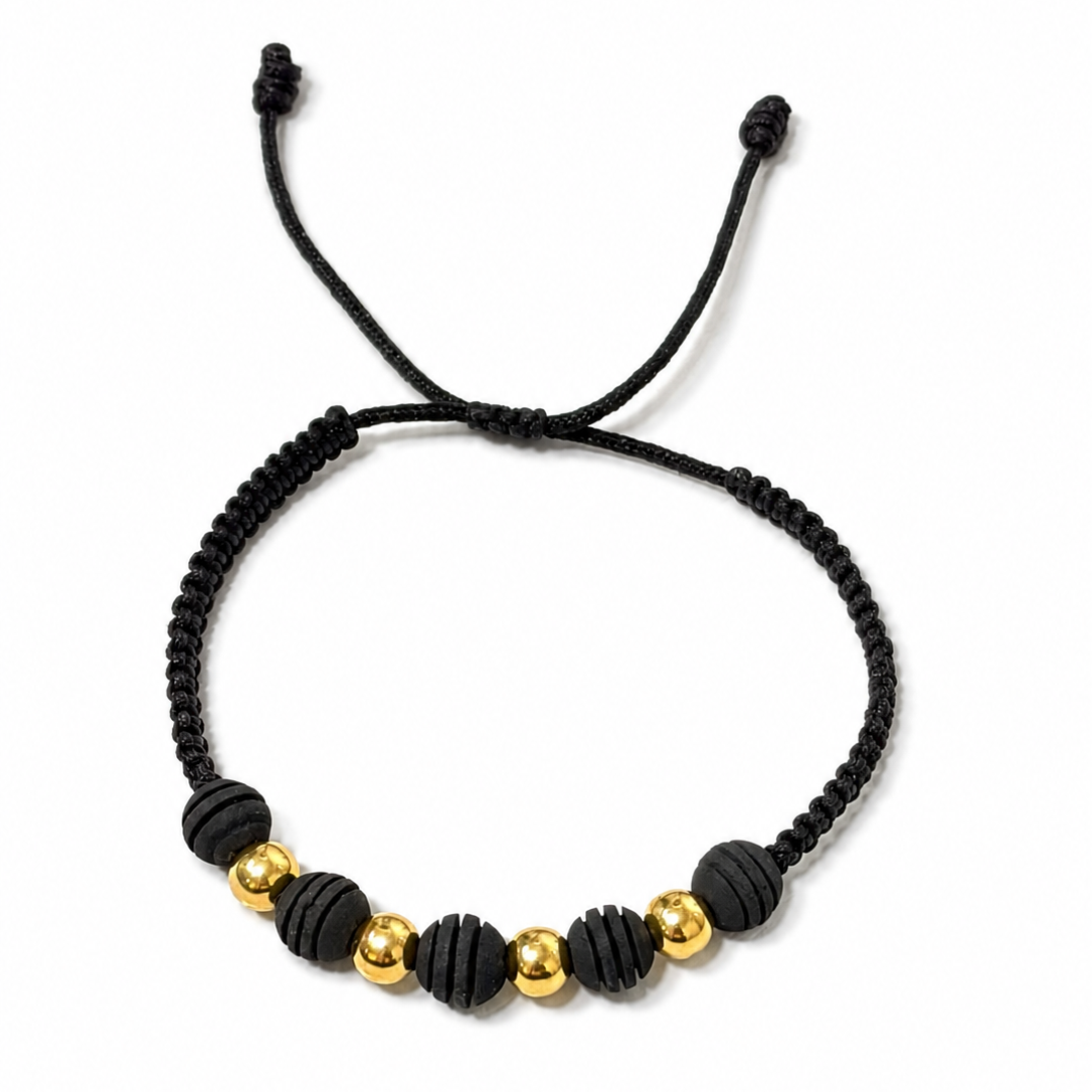 Bracelet with gold beads