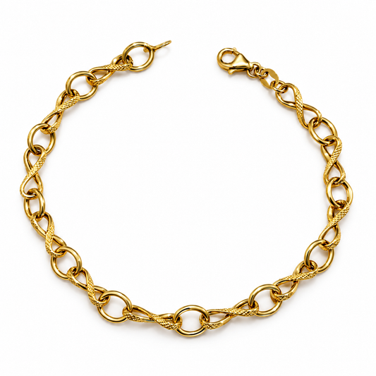 Pulsera Infinito Twist Eslabón / 2.93 gr / 19.5 cm / 5 mm / Oro italiano de 18K