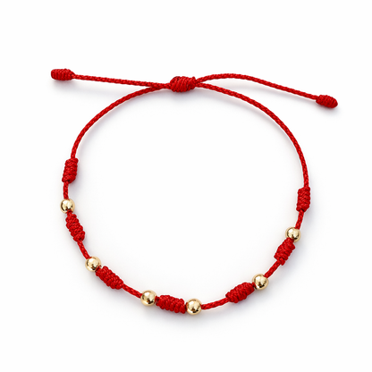7/PULSERA NUDO CON CUENTAS DE ORO