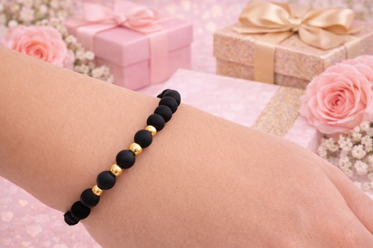 BRACELET WITH GOLD BEADS