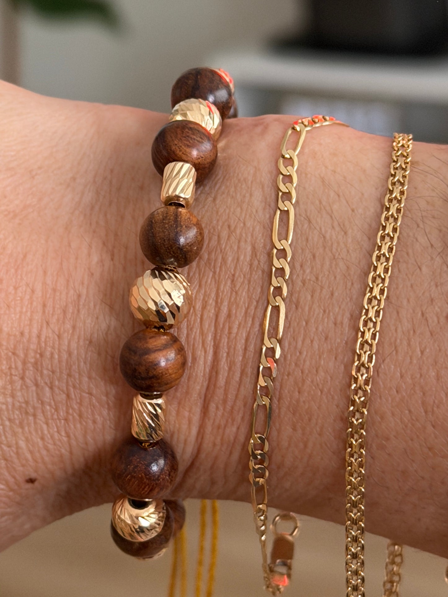 BRACELET WITH GOLD BEADS
