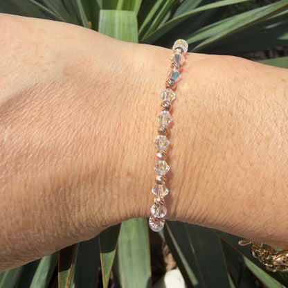 ELASTIC WHITE SWAROVSKI BRACELET WITH ROSE GOLD BEAD