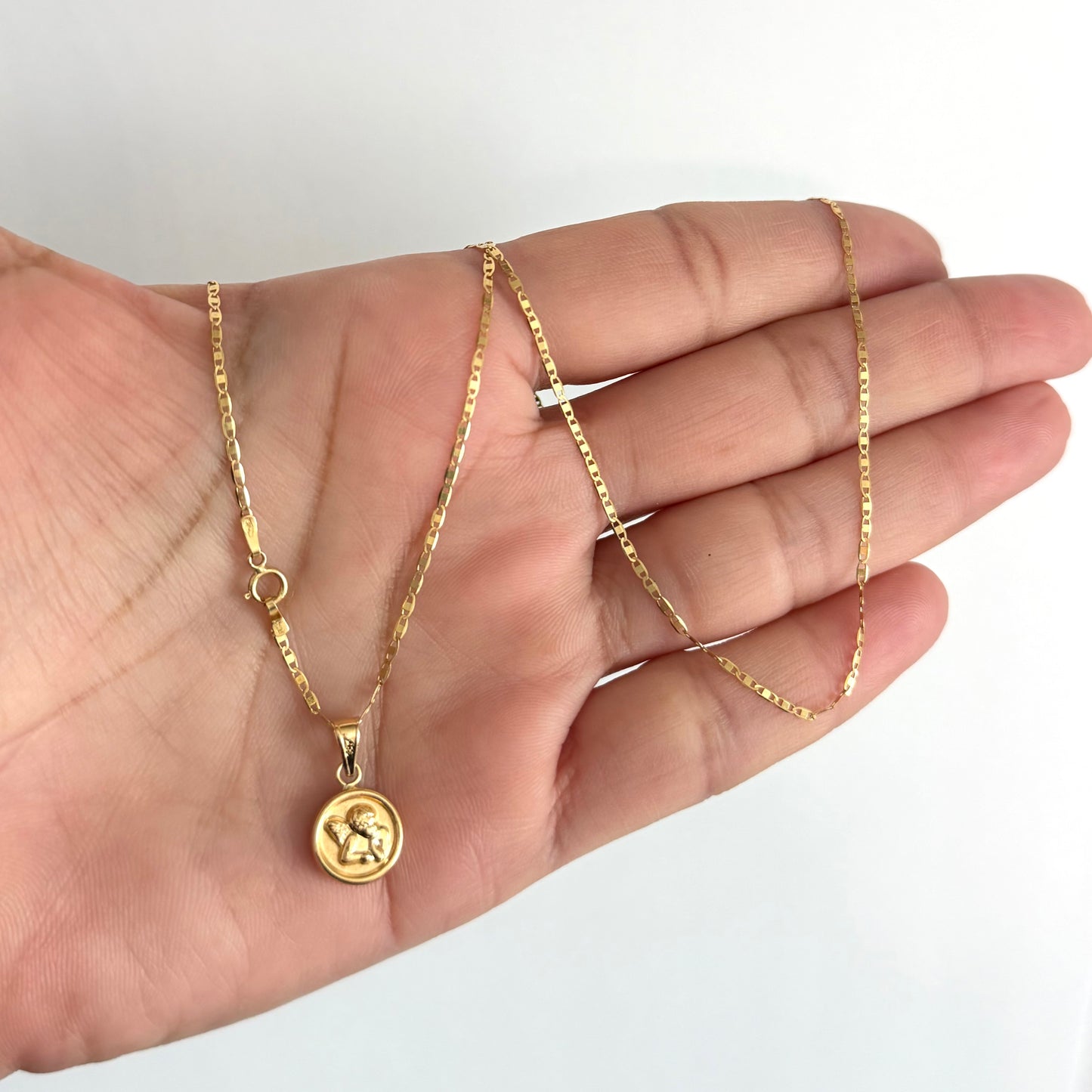 CHAINS WITH ANGEL BAG PENDANT