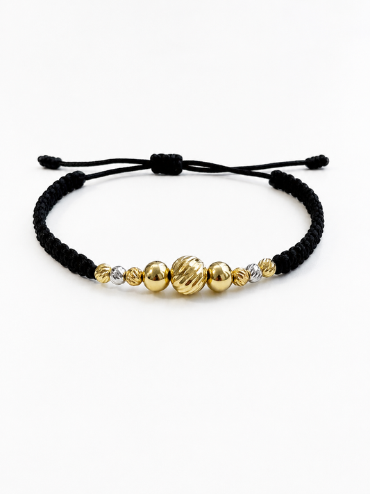 BRACELET WITH GOLD BEADS