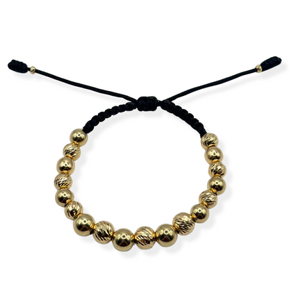 GOLD BRACELET WITH SMOOTH AND DIAMOND-CUT BEADS