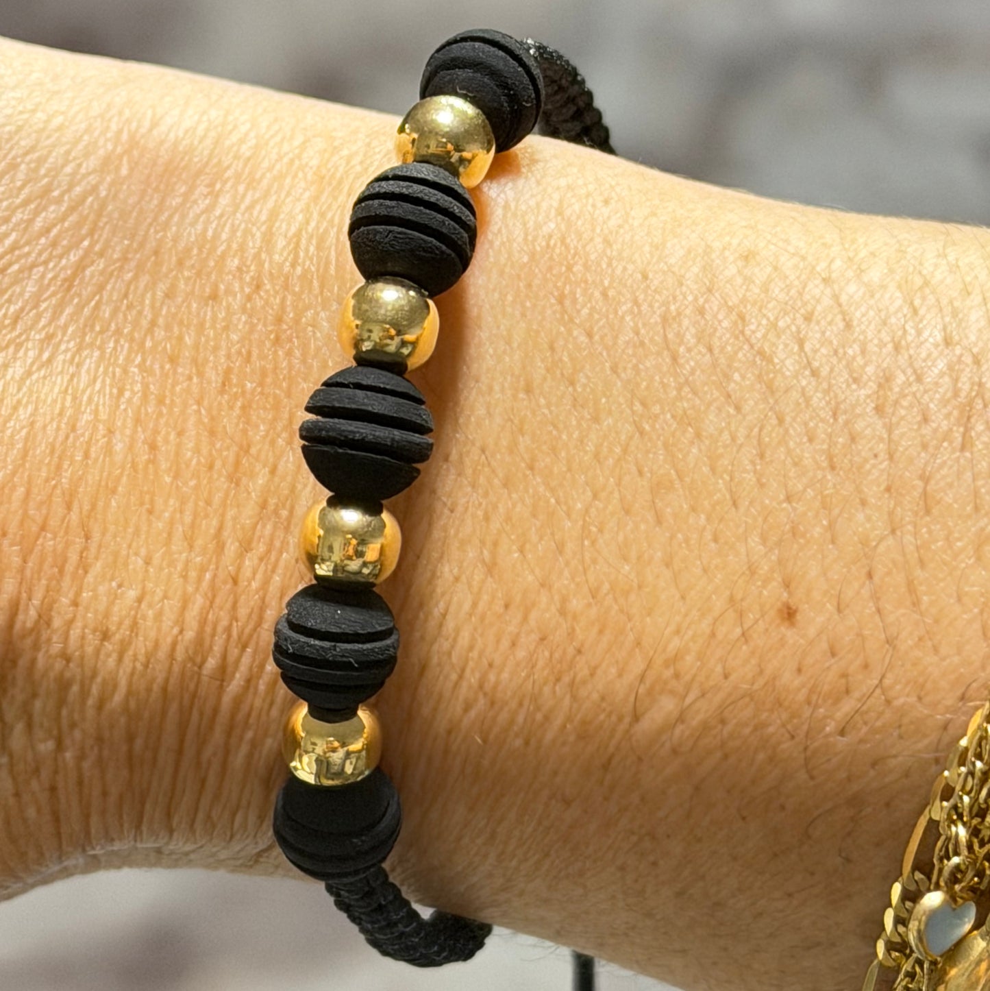 Bracelet with gold beads