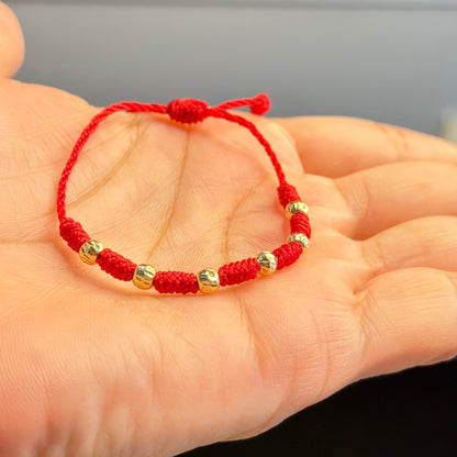 PULSERA DE BEBÉ DE 7 NUDOS/ORO DE 18K