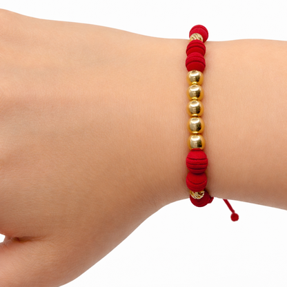 Bracelet with gold beads