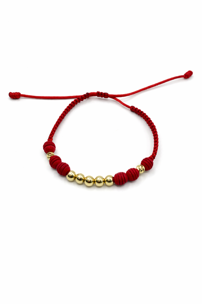 Bracelet with gold beads