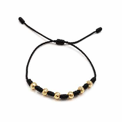 7/PULSERA NUDO CON CUENTAS DE ORO