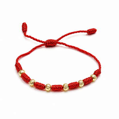 PULSERA DE BEBÉ DE 7 NUDOS/ORO DE 18K