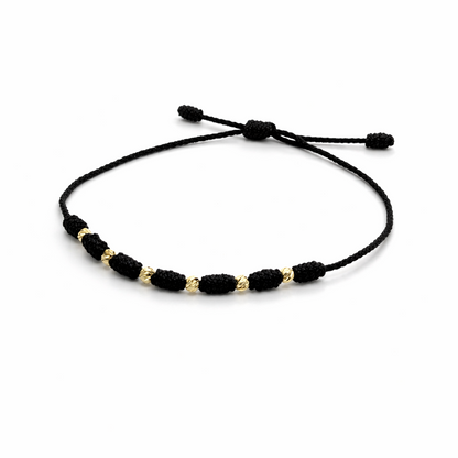 7/PULSERA NUDO CON CUENTAS DE ORO