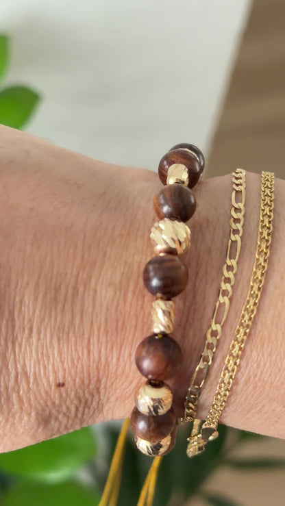 BRACELET WITH GOLD BEADS