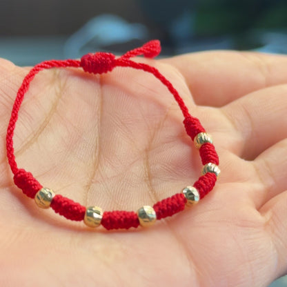 PULSERA DE BEBÉ DE 7 NUDOS/ORO DE 18K
