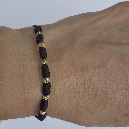 7/PULSERA NUDO CON CUENTAS DE ORO