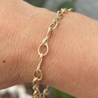 Pulsera Infinito Twist Eslabón / 2.93 gr / 19.5 cm / 5 mm / Oro italiano de 18K